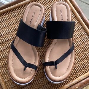 Lucky Brand Black and Tan Slide Toe-Loop Sandal